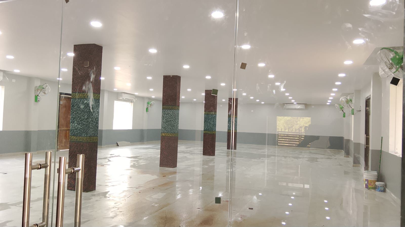 Small function hall glass entrance and open floor